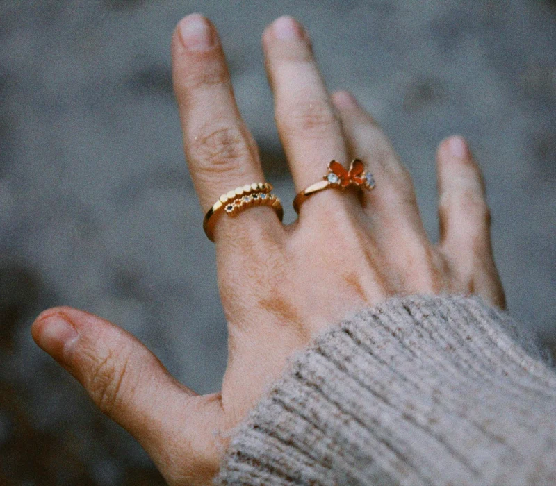wearing gold rings